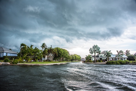 choppy water in front of impact hurricane coastal windows