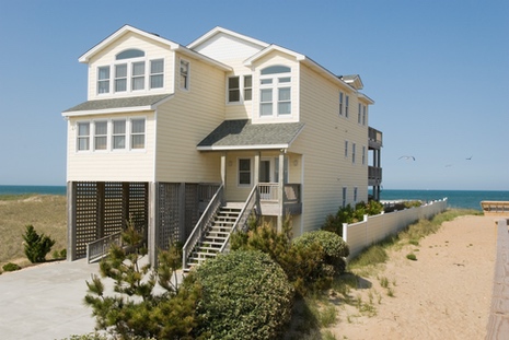 house on beach with impact hurricane coastal windows